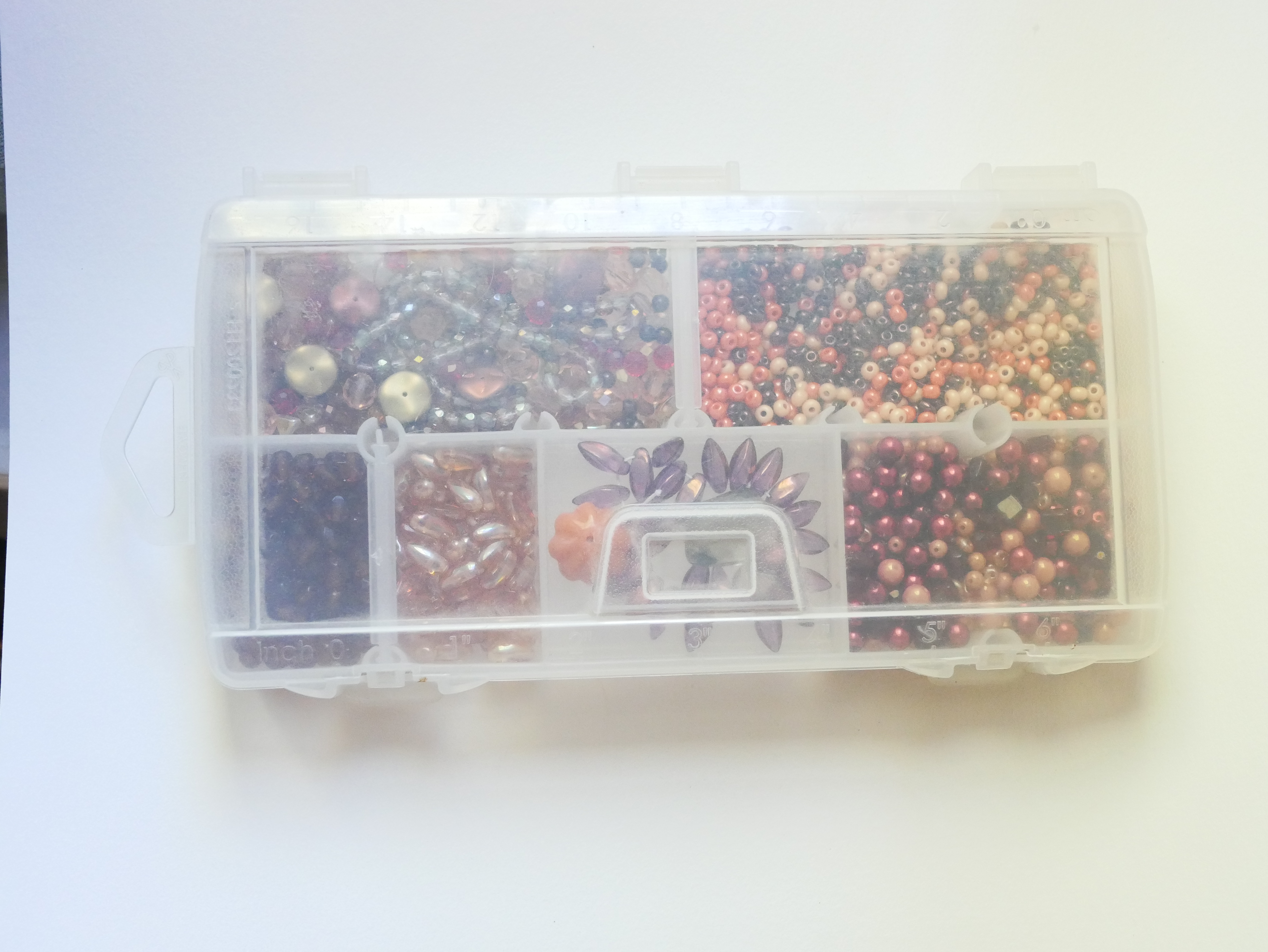 Boite de perles en mélange ambre/pêche/orange/rouge - 360 gr