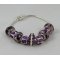 Silverarmband med lila pärlor och strass