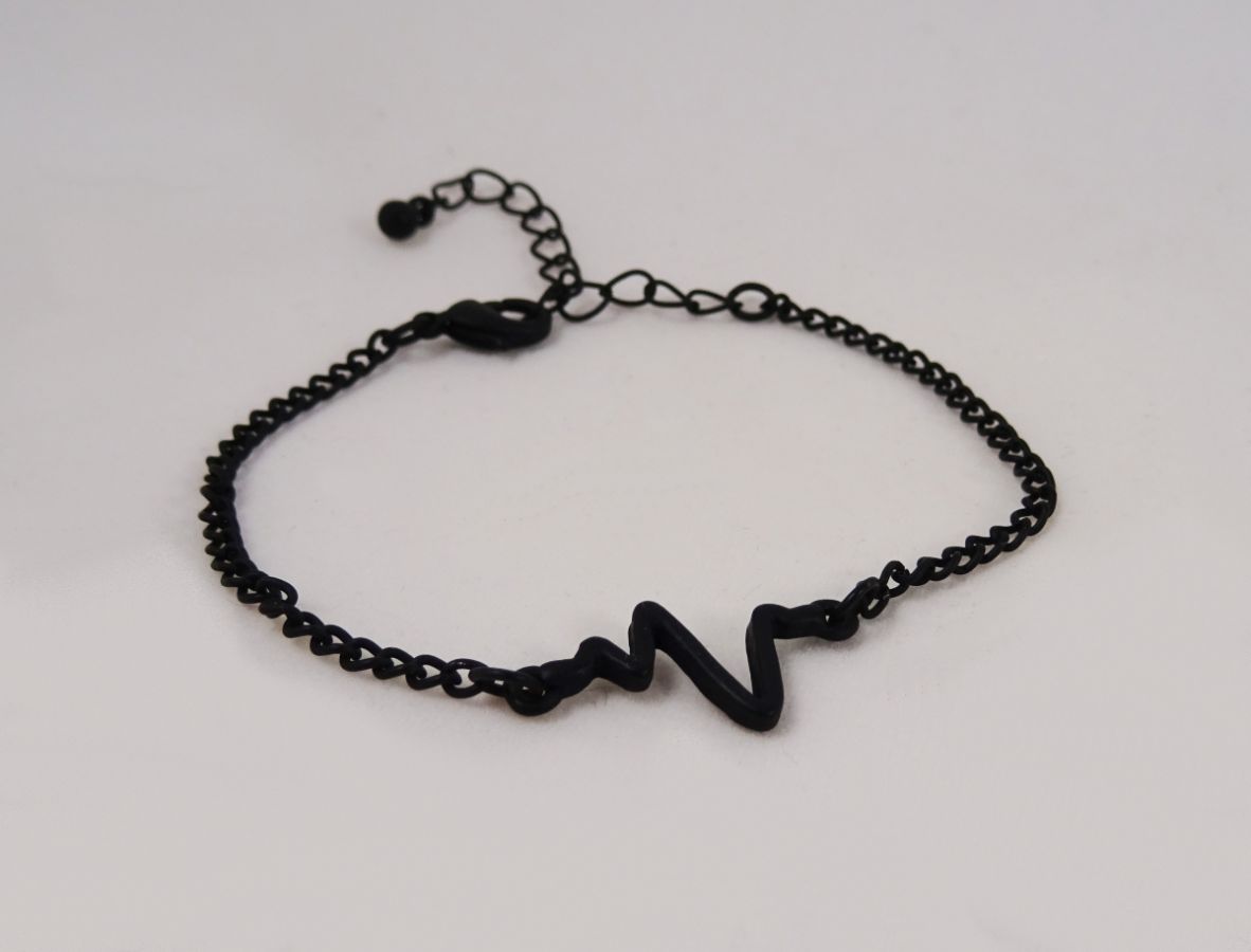 Tunn svart armband design Waves