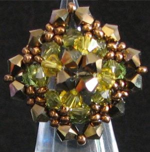 Swarovki kristall snurrande topp 4mm DORADO 2X per 12
