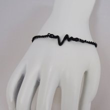 Tunn svart armband design Waves
