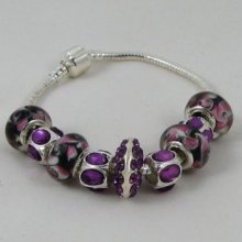 Silverarmband med lila pärlor och strass